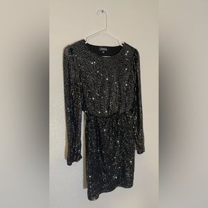 Gorgeous brand new Silver-sequined long sleeve romper